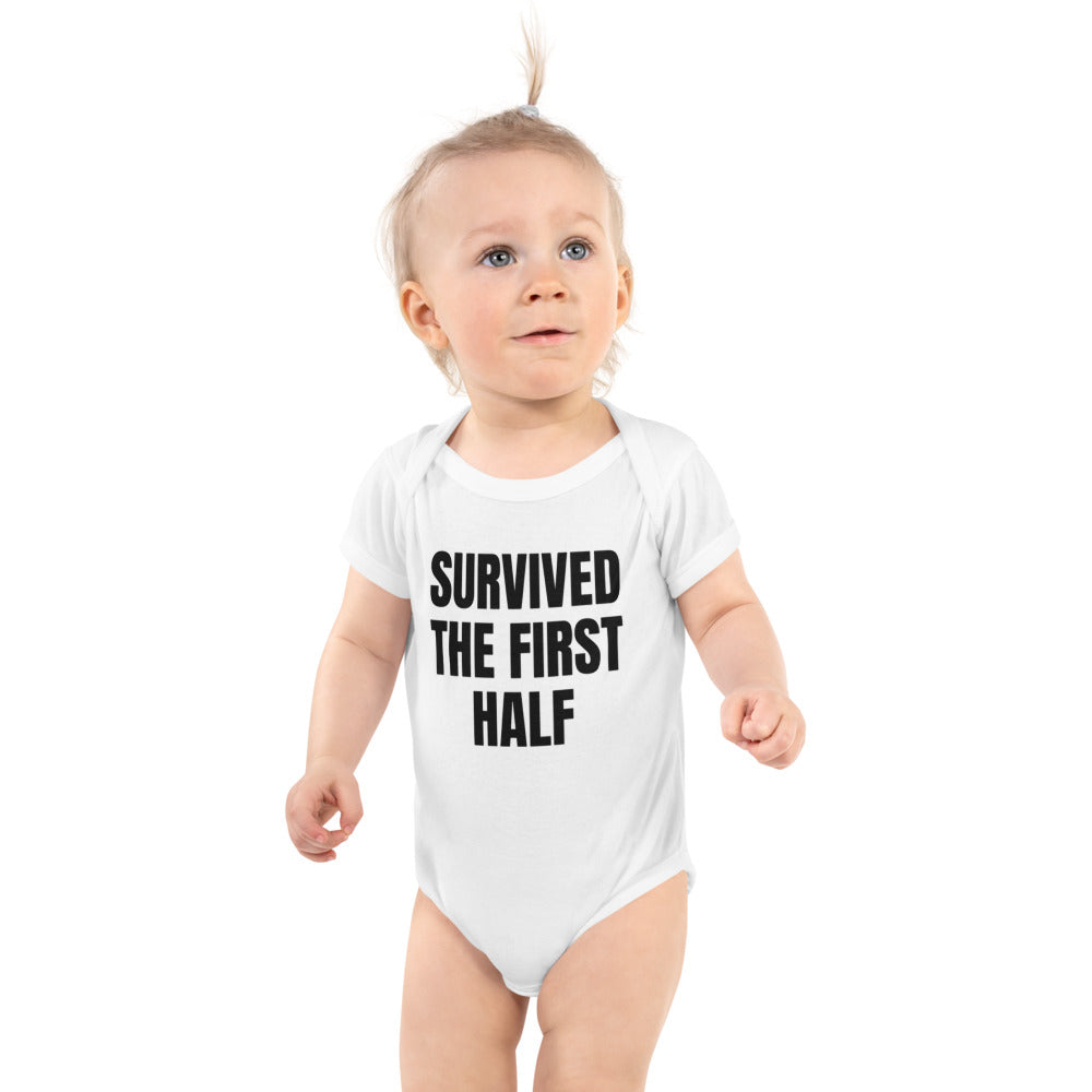 SURVIVED THE FIRST HALF baby bodysuit, white