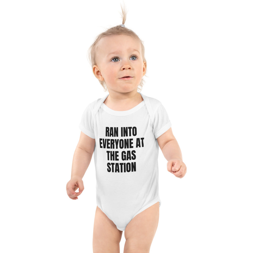 RAN INTO EVERYONE AT THE GAS STATION baby bodysuit, white