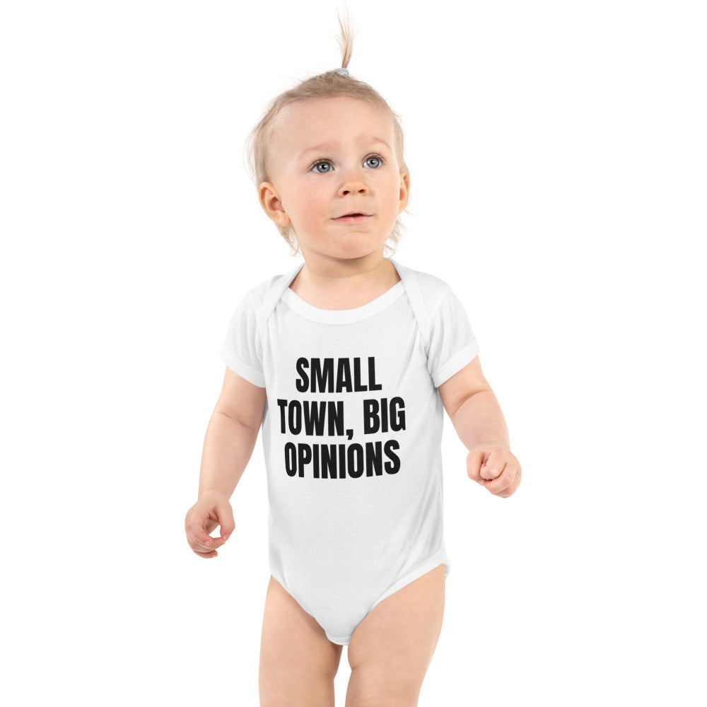 SMALL TOWN, BIG OPINIONS baby bodysuit, white