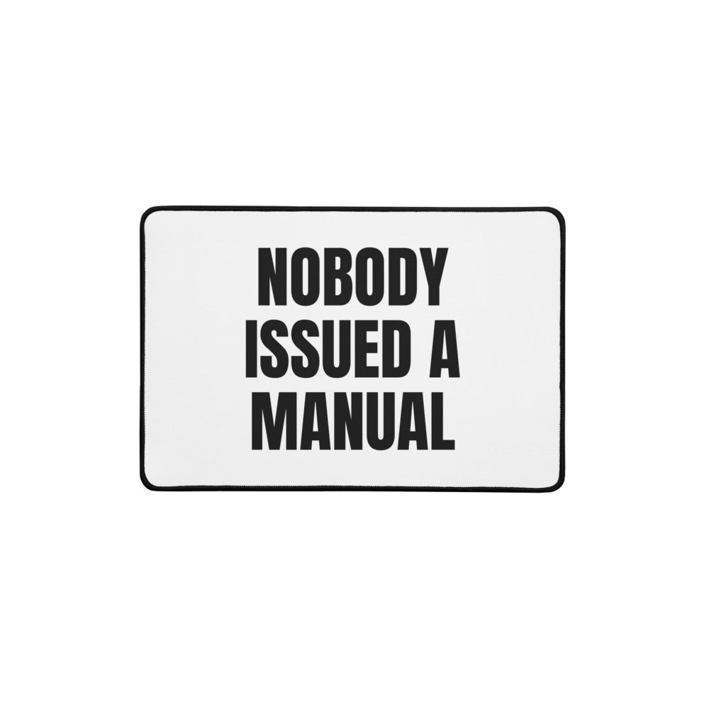 NOBODY ISSUED A MANUAL desk mat