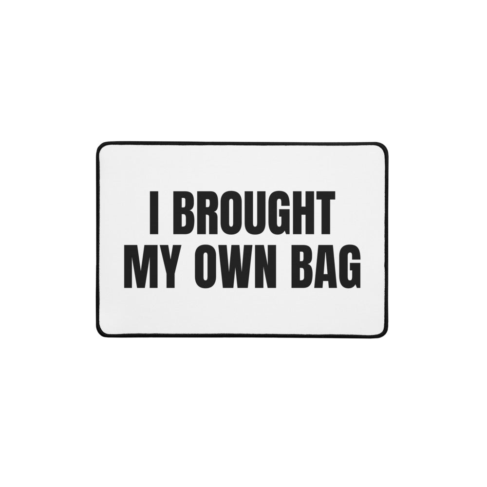 I BROUGHT MY OWN BAG desk mat