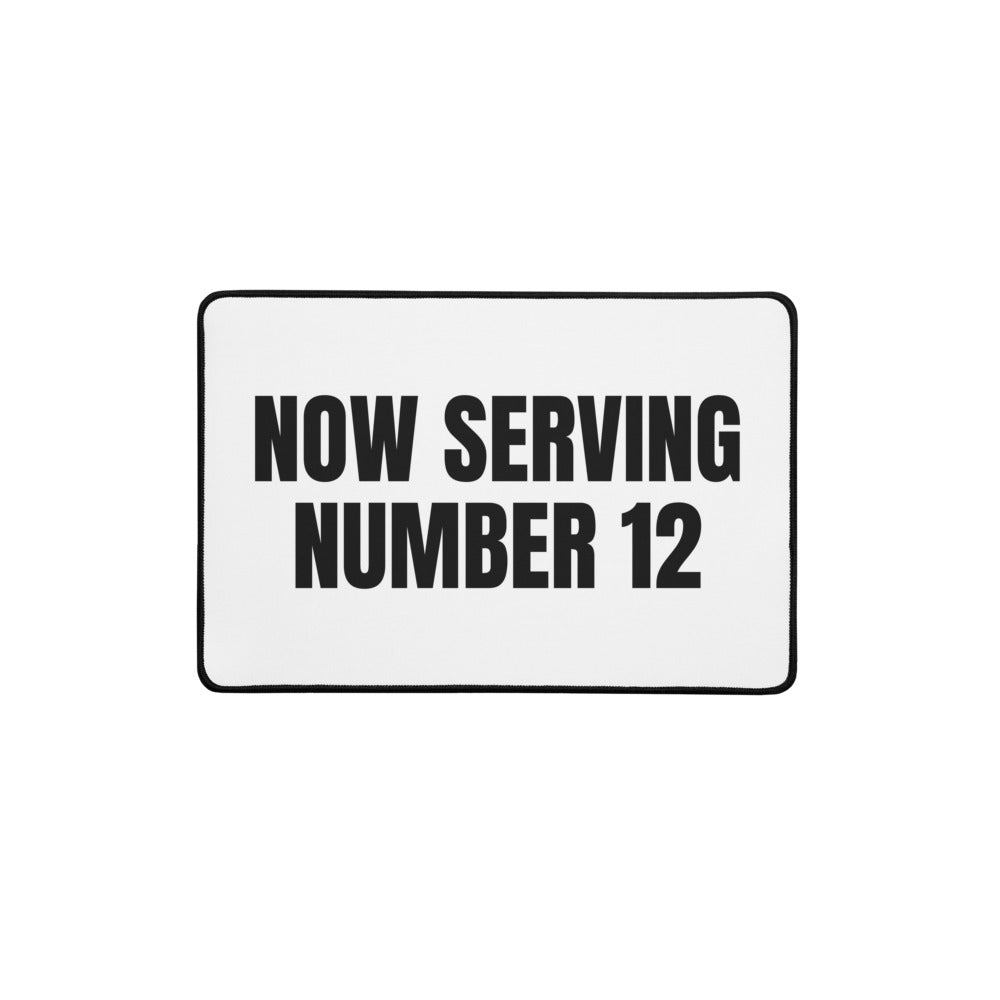 NOW SERVING NUMBER 12 desk mat