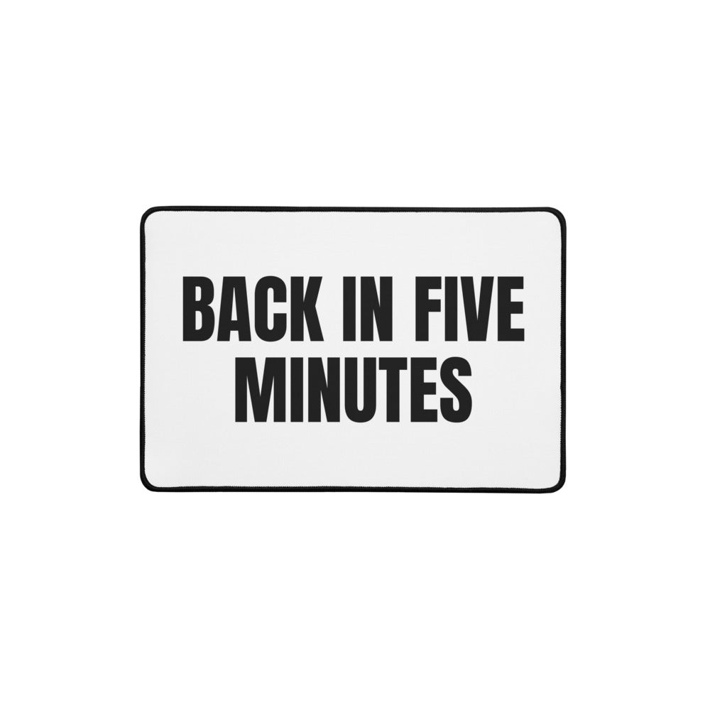 BACK IN FIVE MINUTES desk mat