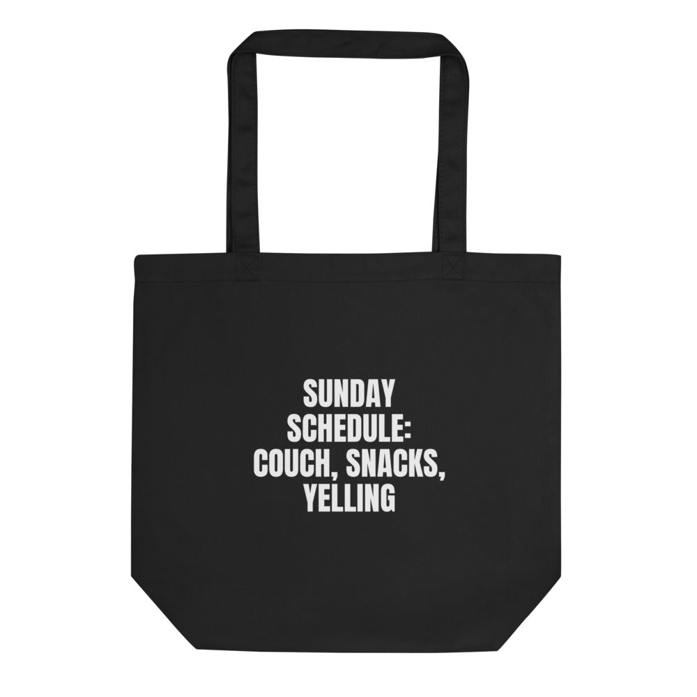 SUNDAY SCHEDULE: COUCH, SNACKS, YELLING tote bag, black