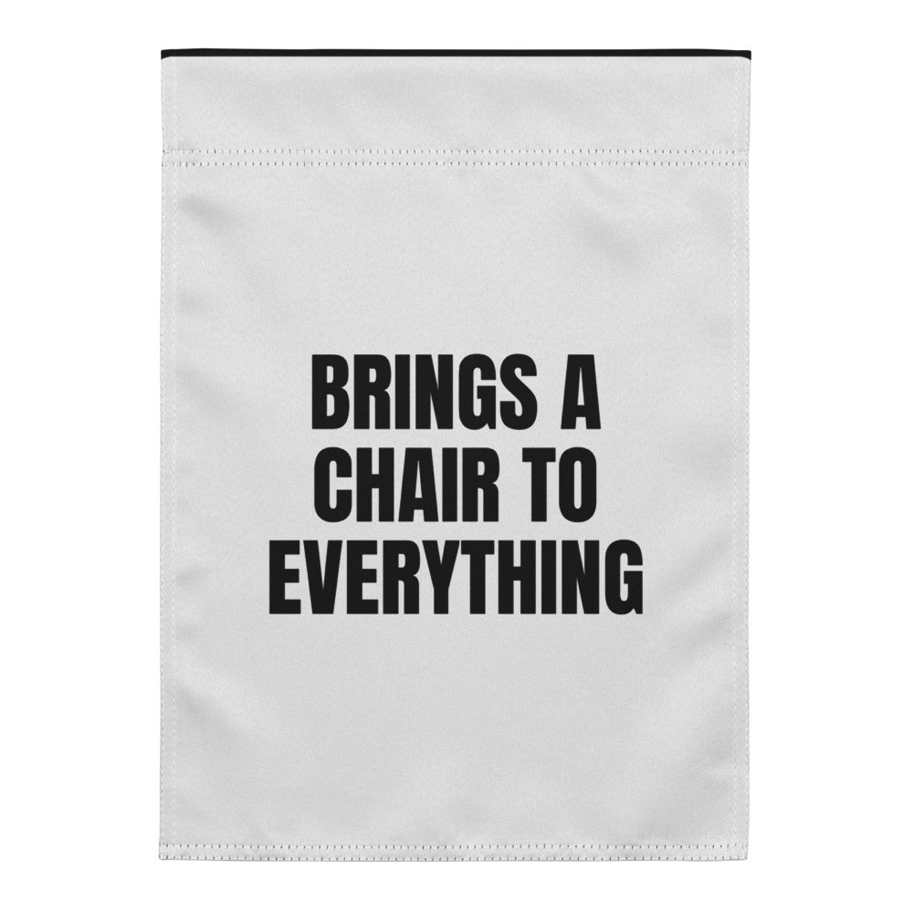 BRINGS A CHAIR TO EVERYTHING yard flag