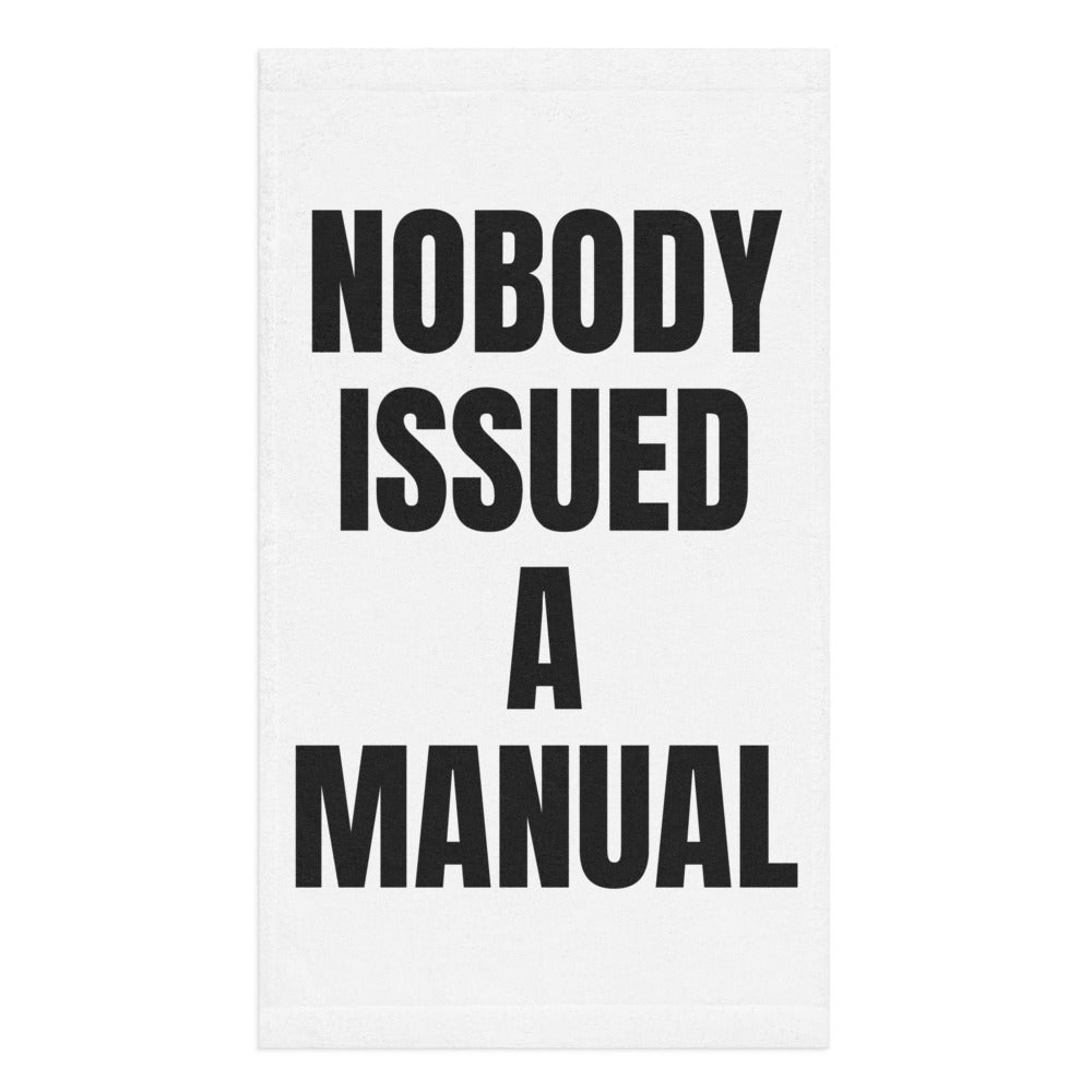 NOBODY ISSUED A MANUAL hand towel