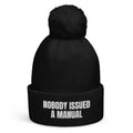 NOBODY ISSUED A MANUAL pom-pom beanie, black