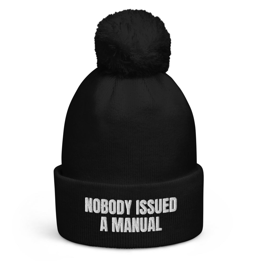 NOBODY ISSUED A MANUAL pom-pom beanie, black