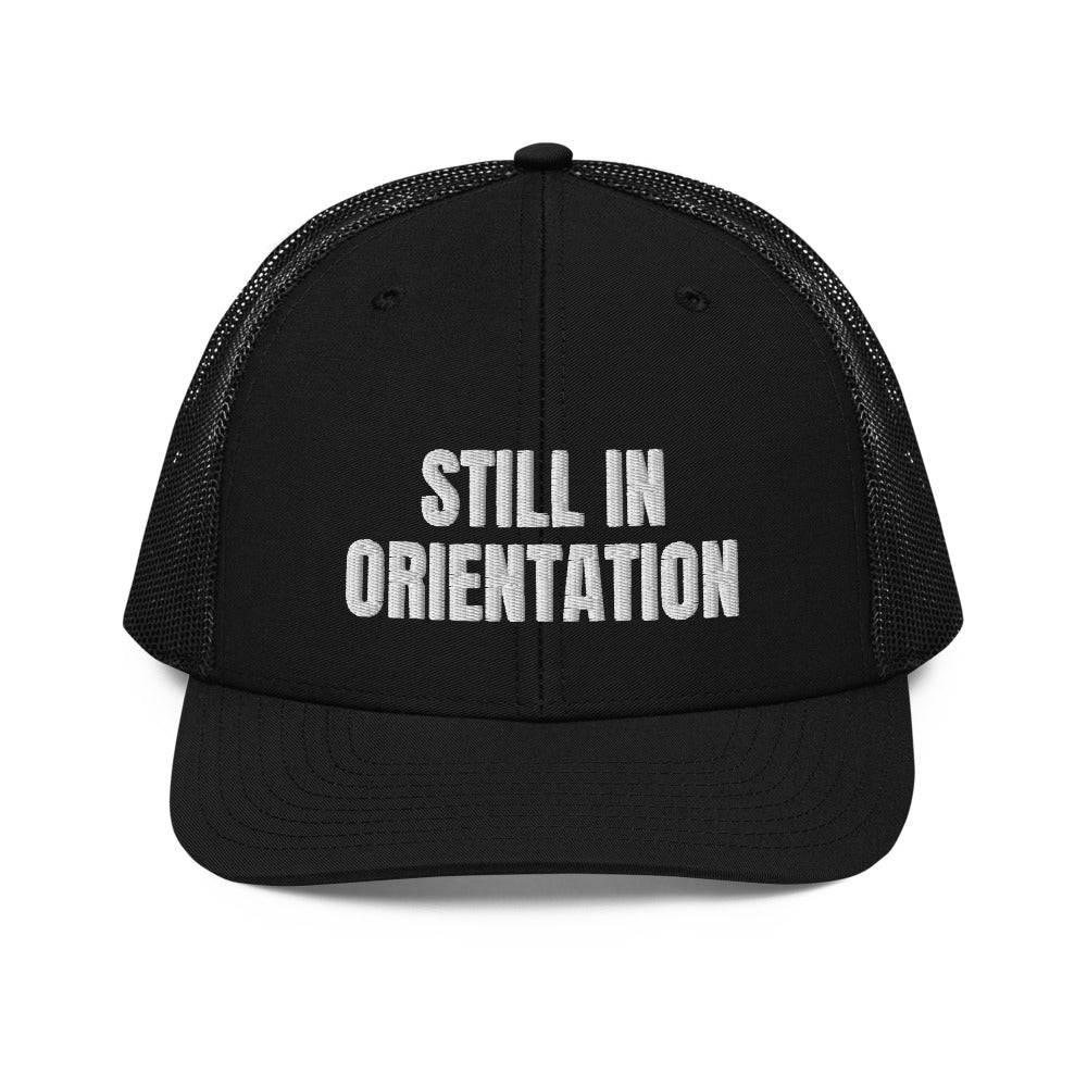 STILL IN ORIENTATION trucker hat, black