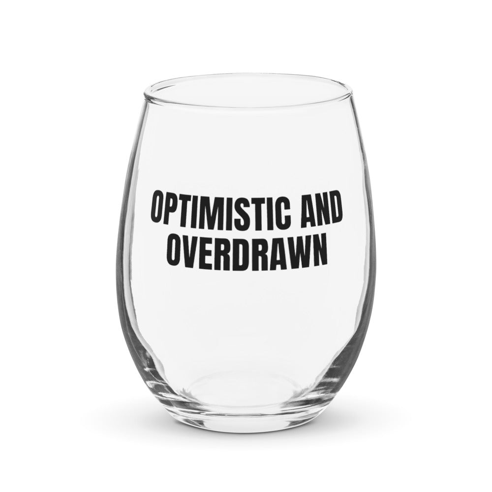 OPTIMISTIC AND OVERDRAWN stemless wine glass
