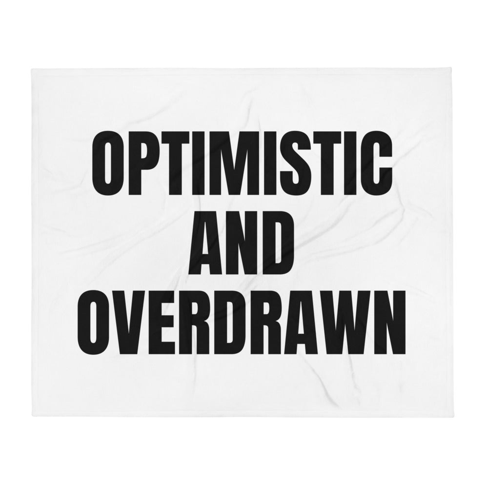 OPTIMISTIC AND OVERDRAWN throw blanket