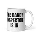 THE CANDY INSPECTOR IS IN mug, white