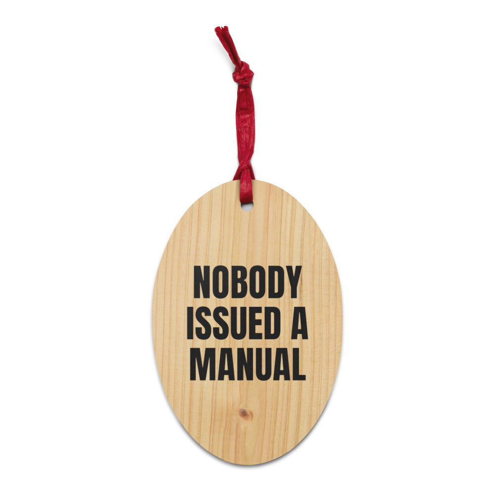 NOBODY ISSUED A MANUAL wood ornament