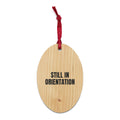 STILL IN ORIENTATION wood ornament