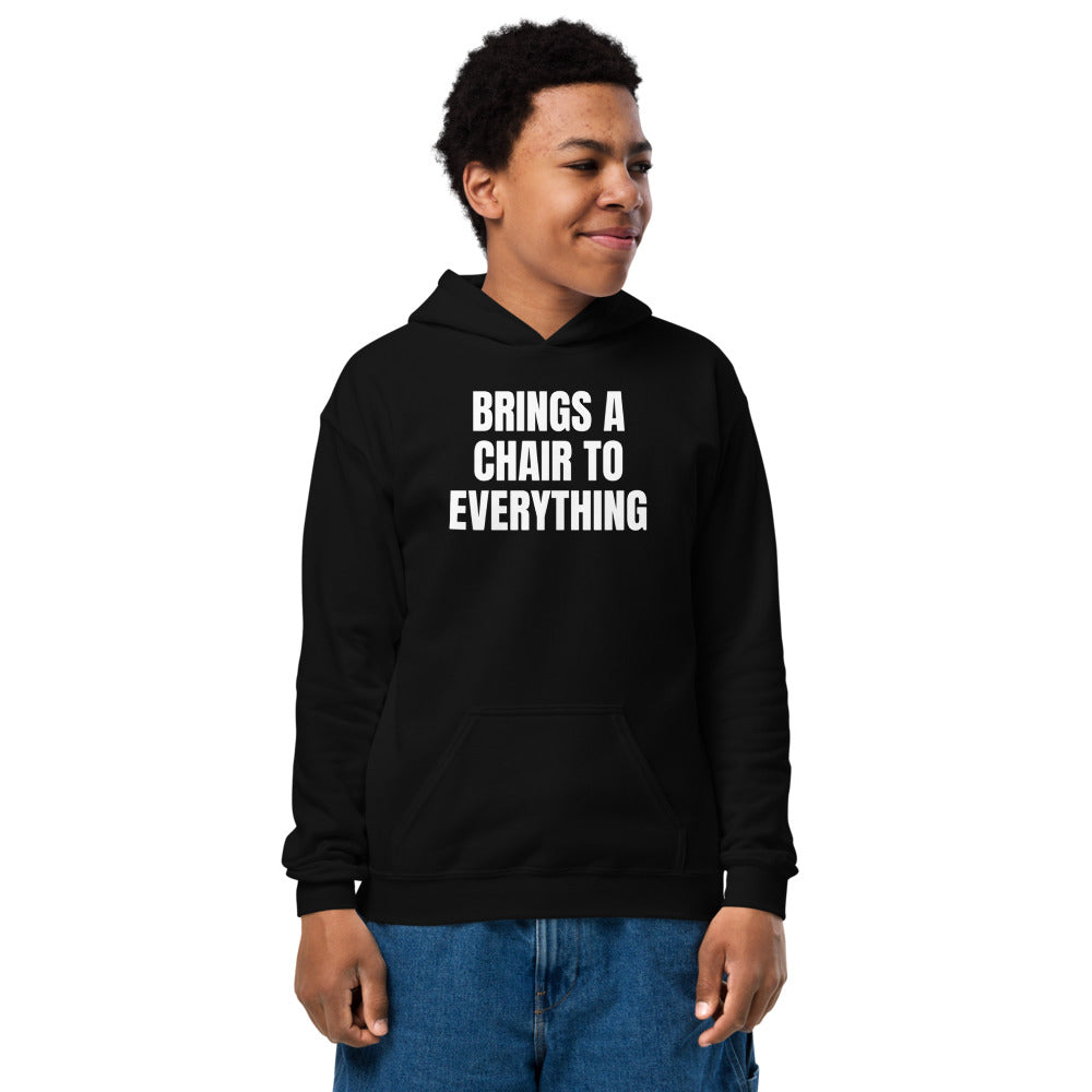 BRINGS A CHAIR TO EVERYTHING kids hoodie, black