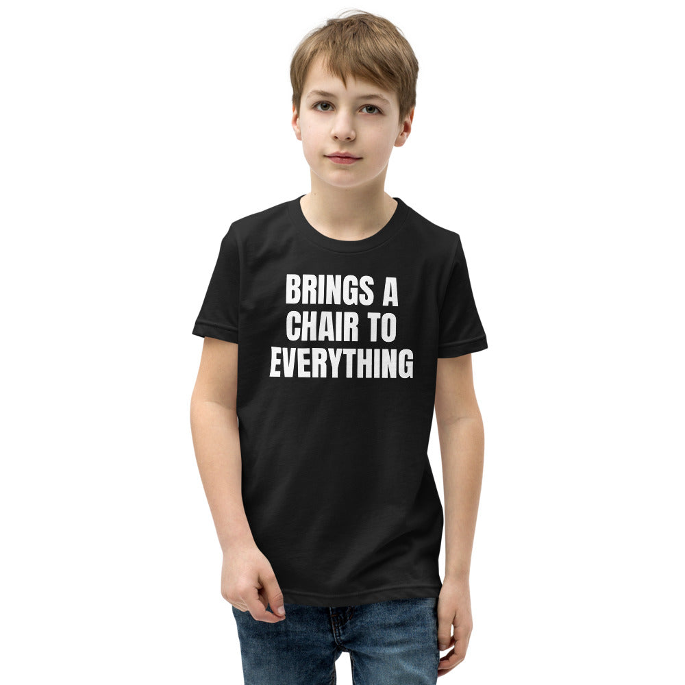 BRINGS A CHAIR TO EVERYTHING kids tee, black